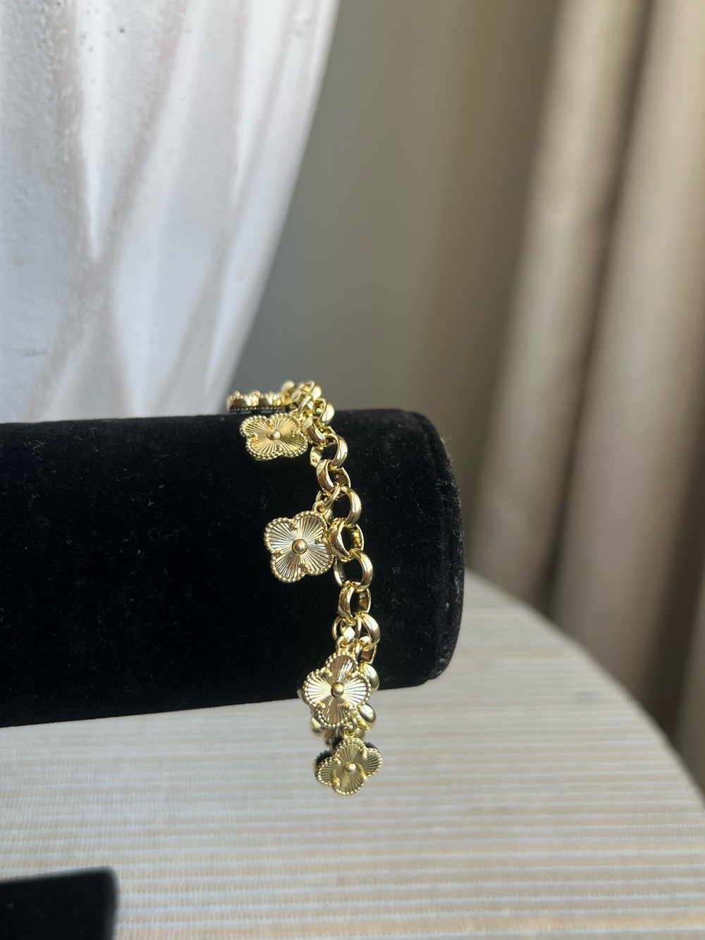 Gold clover charm bracelet